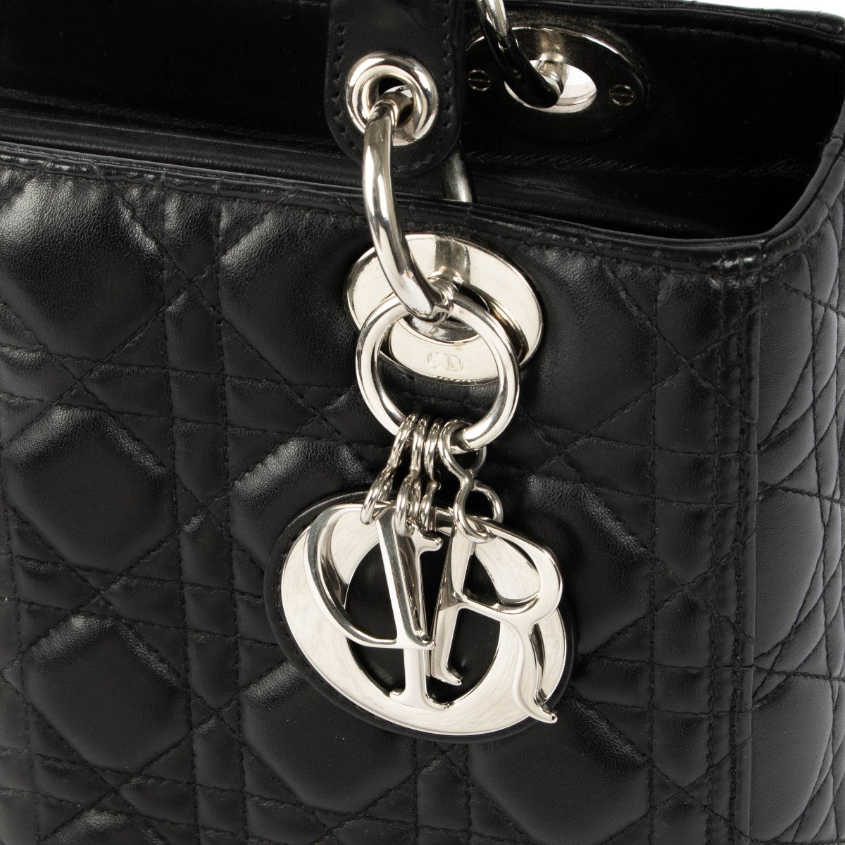 Authentic pre-loved Christian Dior Black Medium Lady Dior Top Handle Bag on Labellov.com