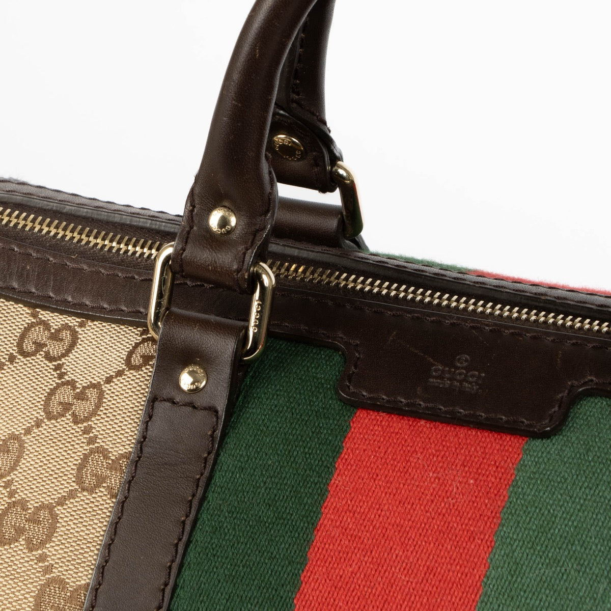 Authentic pre-loved Gucci Monogram Canvas Boston Top Handle Bag on Labellov.com