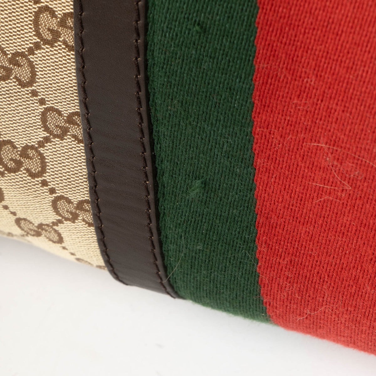 Authentic pre-loved Gucci Monogram Canvas Boston Top Handle Bag on Labellov.com