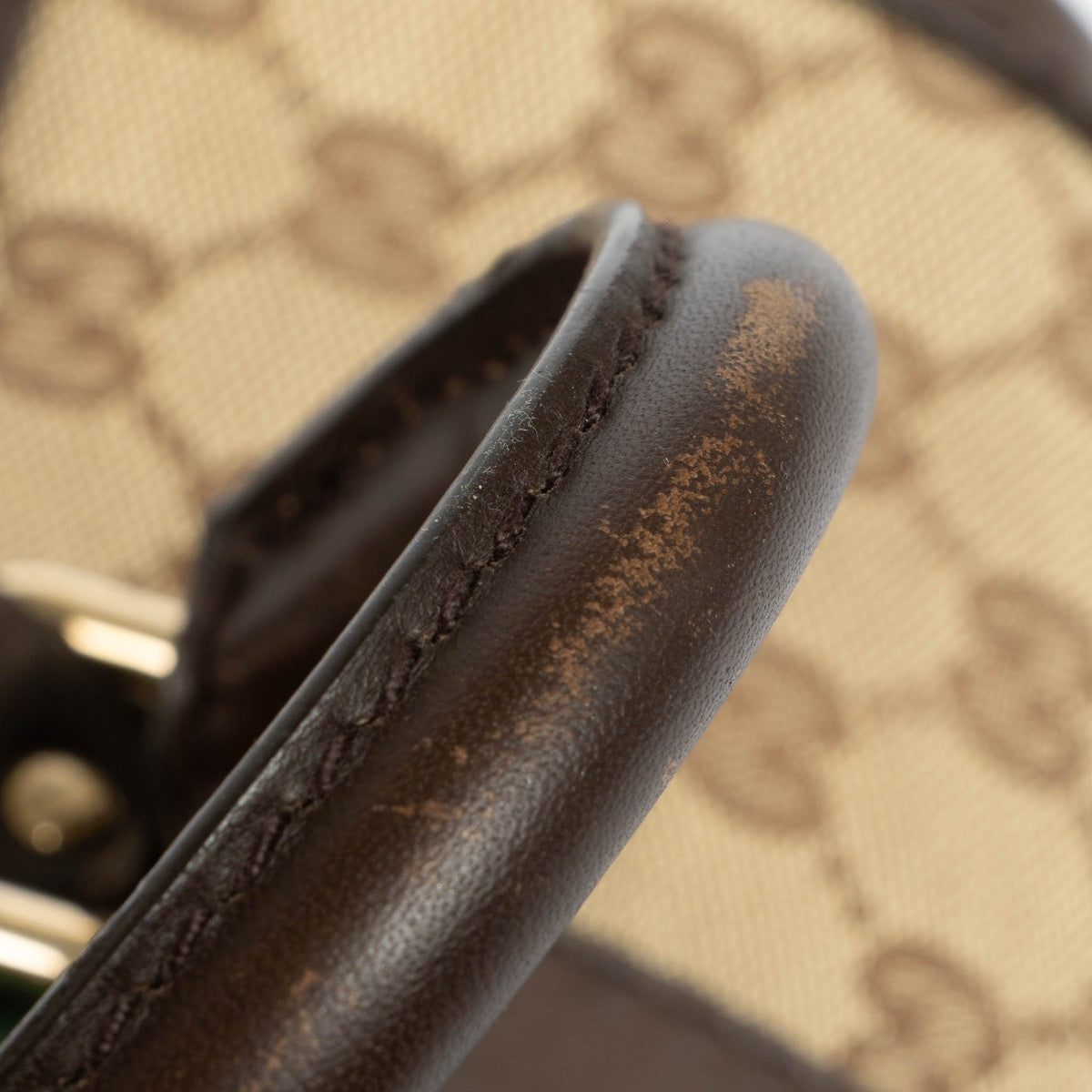 Authentic pre-loved Gucci Monogram Canvas Boston Top Handle Bag on Labellov.com