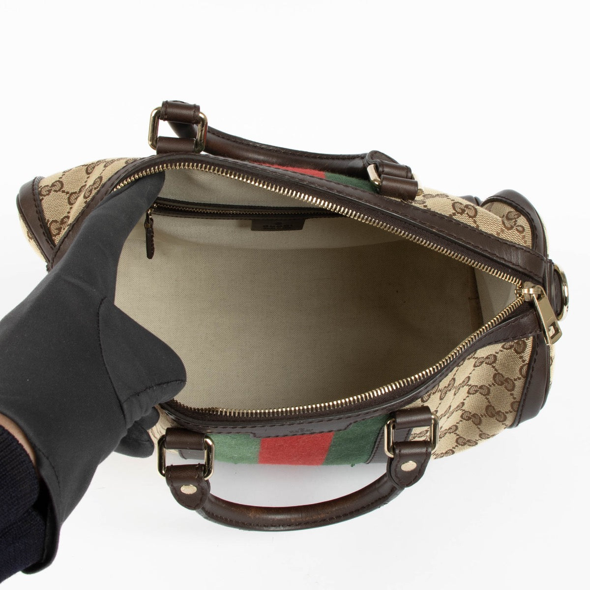 Authentic pre-loved Gucci Monogram Canvas Boston Top Handle Bag on Labellov.com