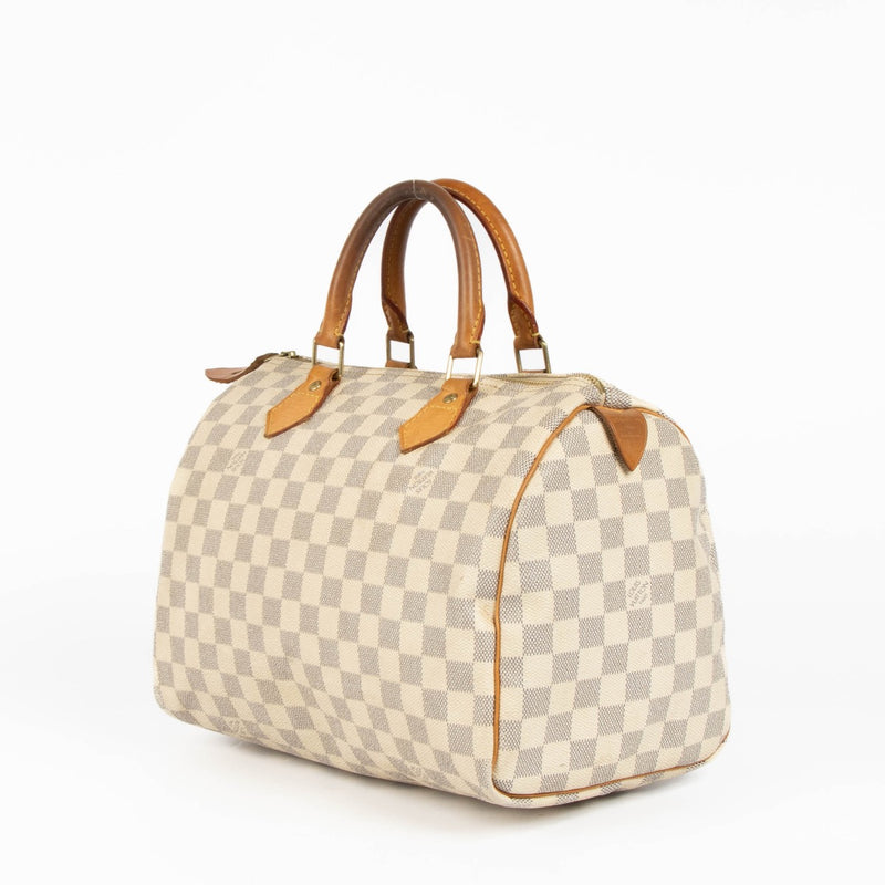 Authentic pre-loved Louis Vuitton White Damier Azur Canvas Speedy 30 Top Handle Bag on Labellov.com