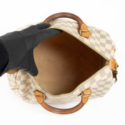 Authentic pre-loved Louis Vuitton White Damier Azur Canvas Speedy 30 Top Handle Bag on Labellov.com