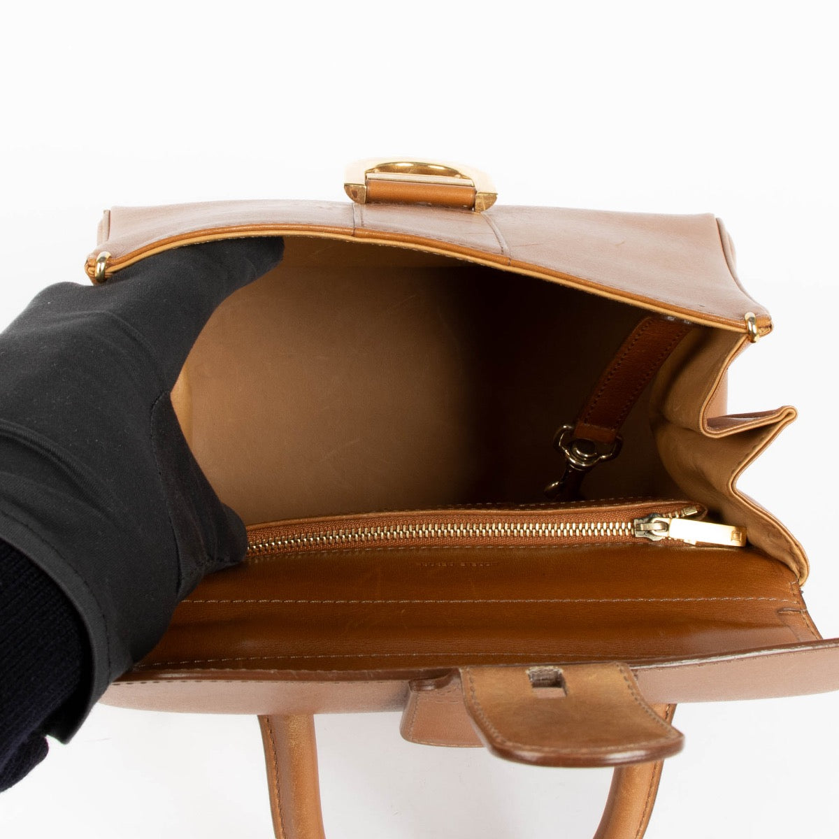 Authentic pre-loved Delvaux Brown Brillant PM Calfskin Top Handle Bag on Labellov.com