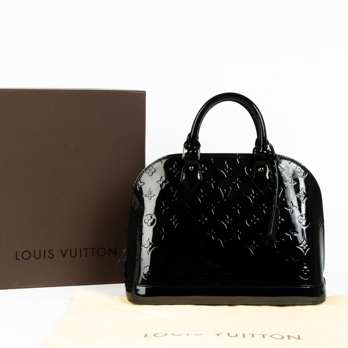 Authentic pre-loved Louis Vuitton Black Vernis Alma PM Top Handle Bag on Labellov.com