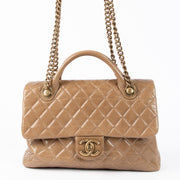 Shop this authentic Chanel Taupe Glazed Calfskin Large Castle Rock Flap Bag pre-loved on Labellov.com
