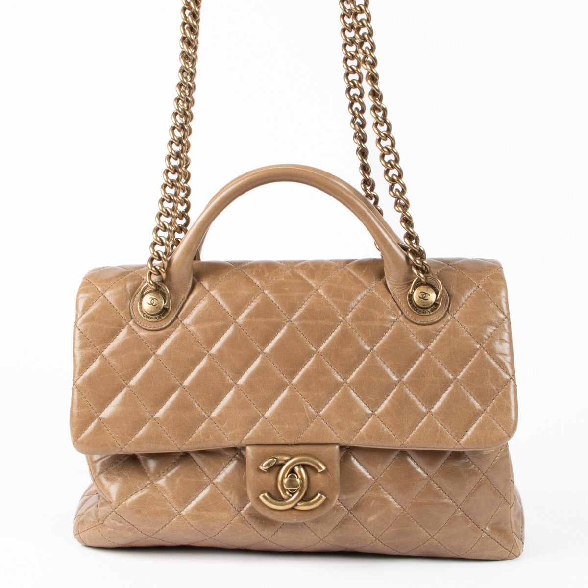 Shop this authentic Chanel Taupe Glazed Calfskin Large Castle Rock Flap Bag pre-loved on Labellov.com