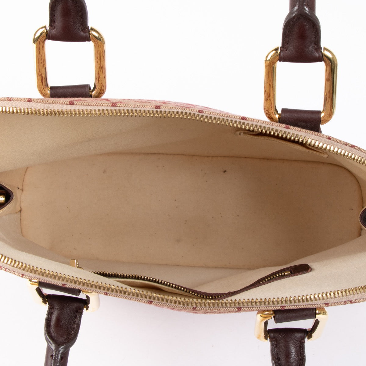 Shop this authentic Louis Vuitton Monogram Mini Lin Alma Vertical Bag pre-loved on Labellov.com