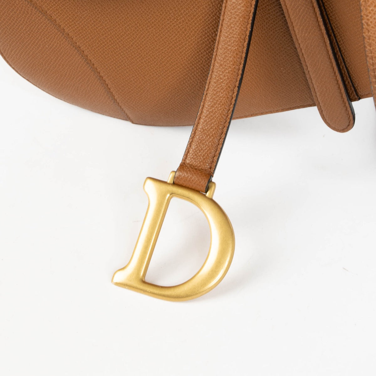 Authentic pre-loved Christian Dior Camel Calfskin Saddle Shoulder Bag on Labellov.com