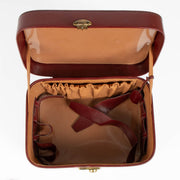 Delvaux burgundy leather beauty case luxury travel accessory