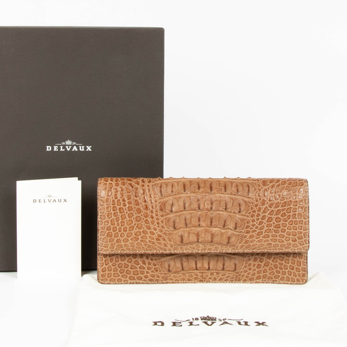 Shop the authentic Delvaux Brown Alligator Hannelore Clutch second hand on Labellov.com