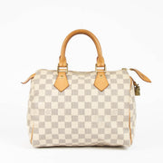 Shop the authentic Louis Vuitton Damier Azur Speedy 25 Top Handle second hand on Labellov.com