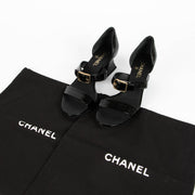 Shop this 100% authentic Chanel 22S Black Patent Goatskin Sandals at Labellov.com