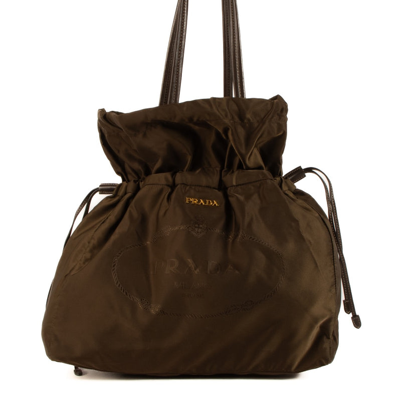 Shop safe online at Labellov in Antwerp, Brussels and Knokke this 100% authentic second hand Prada Brown Nylon Drawstring Tote Bag