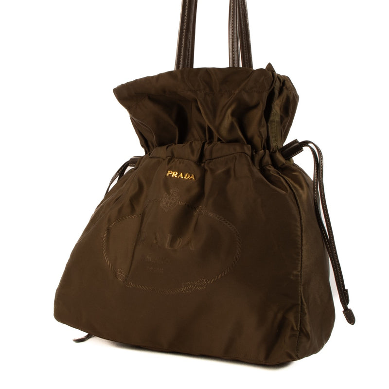 Shop safe online at Labellov in Antwerp, Brussels and Knokke this 100% authentic second hand Prada Brown Nylon Drawstring Tote Bag
