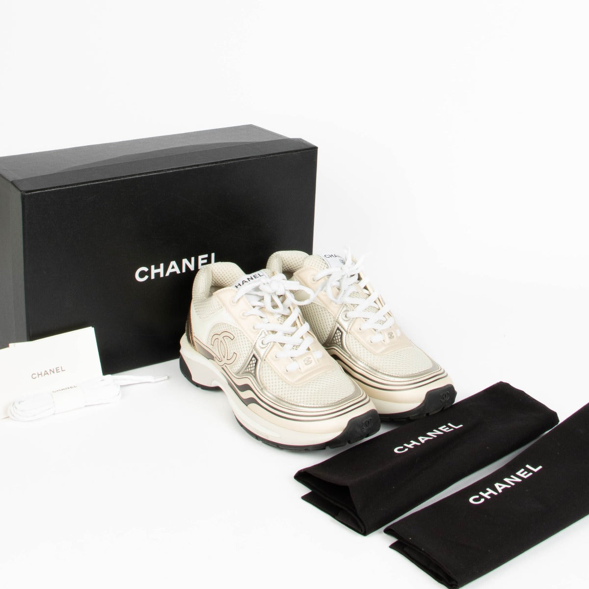 Shop this 100% authentic Chanel White Rose Gold Sneakers in size 39 at Labellov.com
