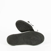 Shop this 100% authentic Chanel Grey Black Sneakers in size 39 at Labellov.com