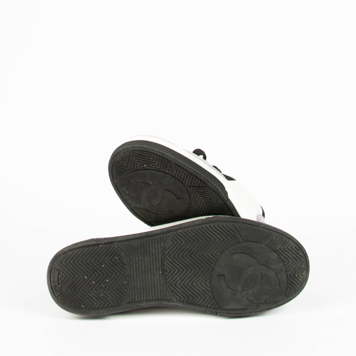 Shop this 100% authentic Chanel Grey Black Sneakers in size 39 at Labellov.com