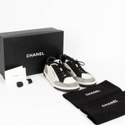 Shop this 100% authentic Chanel Grey Black Sneakers in size 39 at Labellov.com