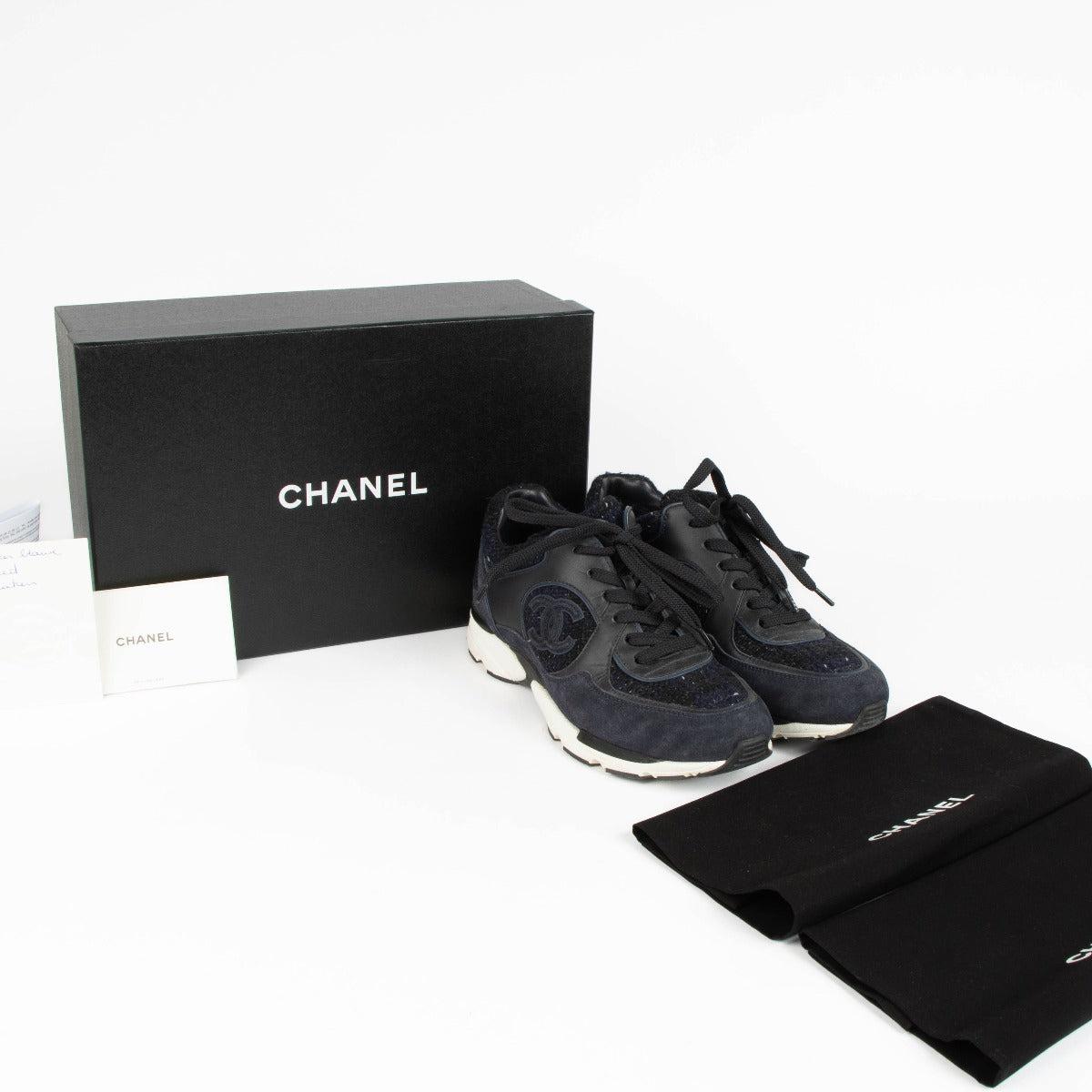 Shop this 100% authentic Chanel Blue Tweed Sneakers in size 39 at Labellov.com