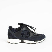 Shop this 100% authentic Chanel Blue Tweed Sneakers in size 39 at Labellov.com