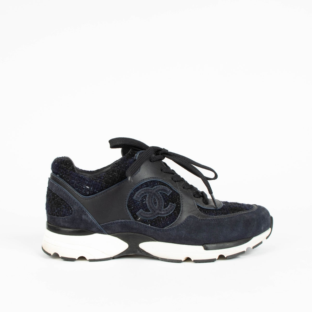 Shop this 100% authentic Chanel Blue Tweed Sneakers in size 39 at Labellov.com