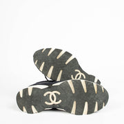 Shop this 100% authentic Chanel Blue Tweed Sneakers in size 39 at Labellov.com