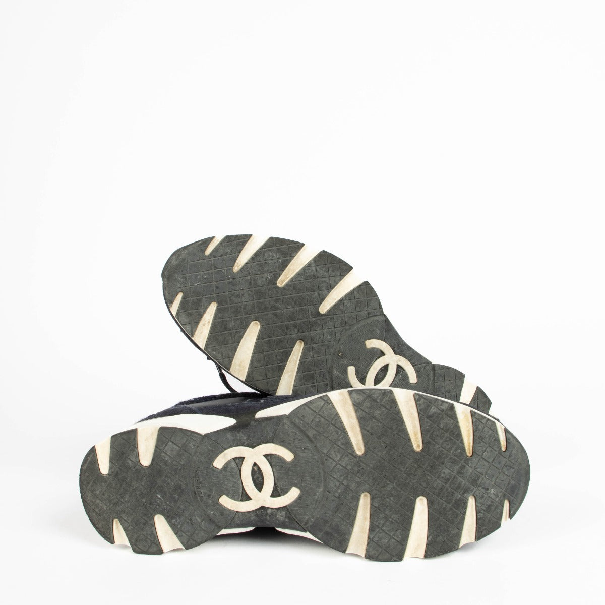 Shop this 100% authentic Chanel Blue Tweed Sneakers in size 39 at Labellov.com