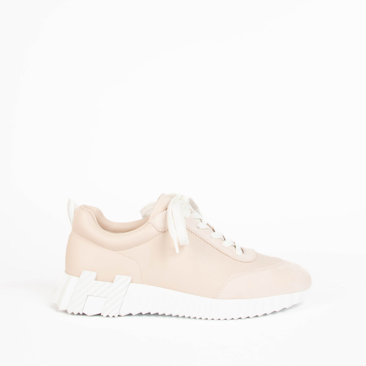 Shop this 100% authentic Hermès Rose Palomino Bouncing Sneakers in size 39 at Labellov.com.