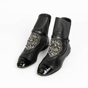 100% authentic second hand Chanel Black Crystal Embellished CC Cap Toe Boots in size 38 at Labellov.