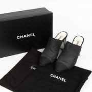 100% authentic Chanel Black Glitter Cap Toe Mules in size 39 with subtle glitter finish and iconic cap toe design.