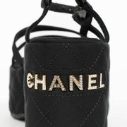 Authentic pre-loved Chanel Black Cloth Platform Sandals - Size 38 on Labellov.com
