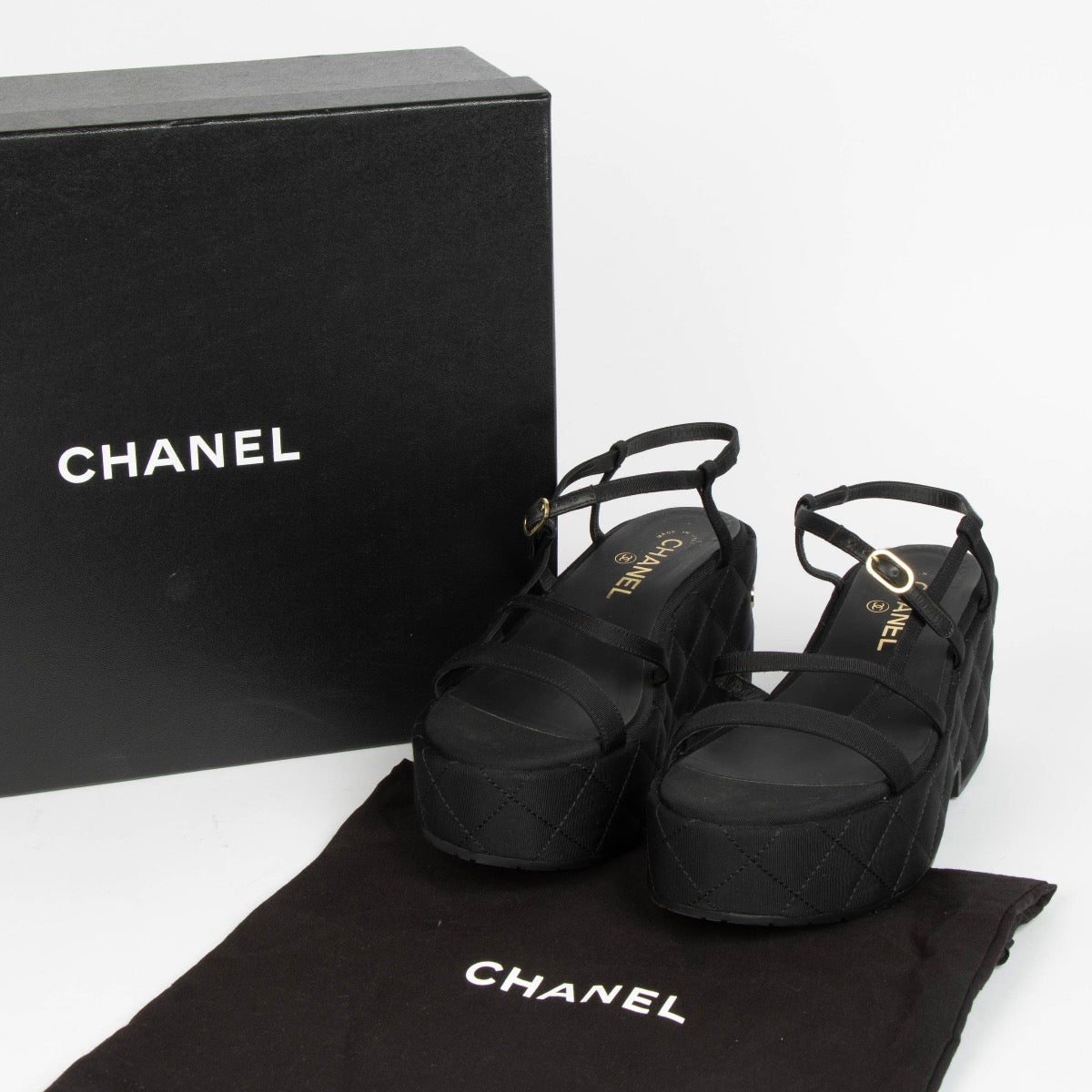 Authentic pre-loved Chanel Black Cloth Platform Sandals - Size 38 on Labellov.com