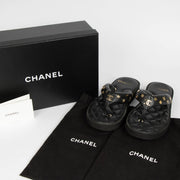 Authentic pre-loved Chanel Black Quilted Charms Thong Sandals -Size 38.5 on Labellov.com