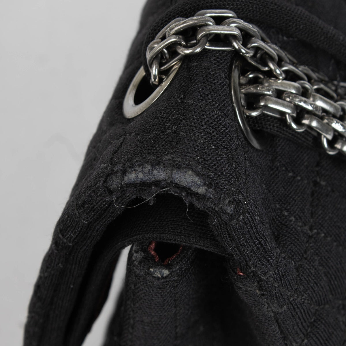 Authentic pre-loved Chanel Black Jersey Coco's Croc Medium 2.55 Reissue Flap Bag on Labellov.com