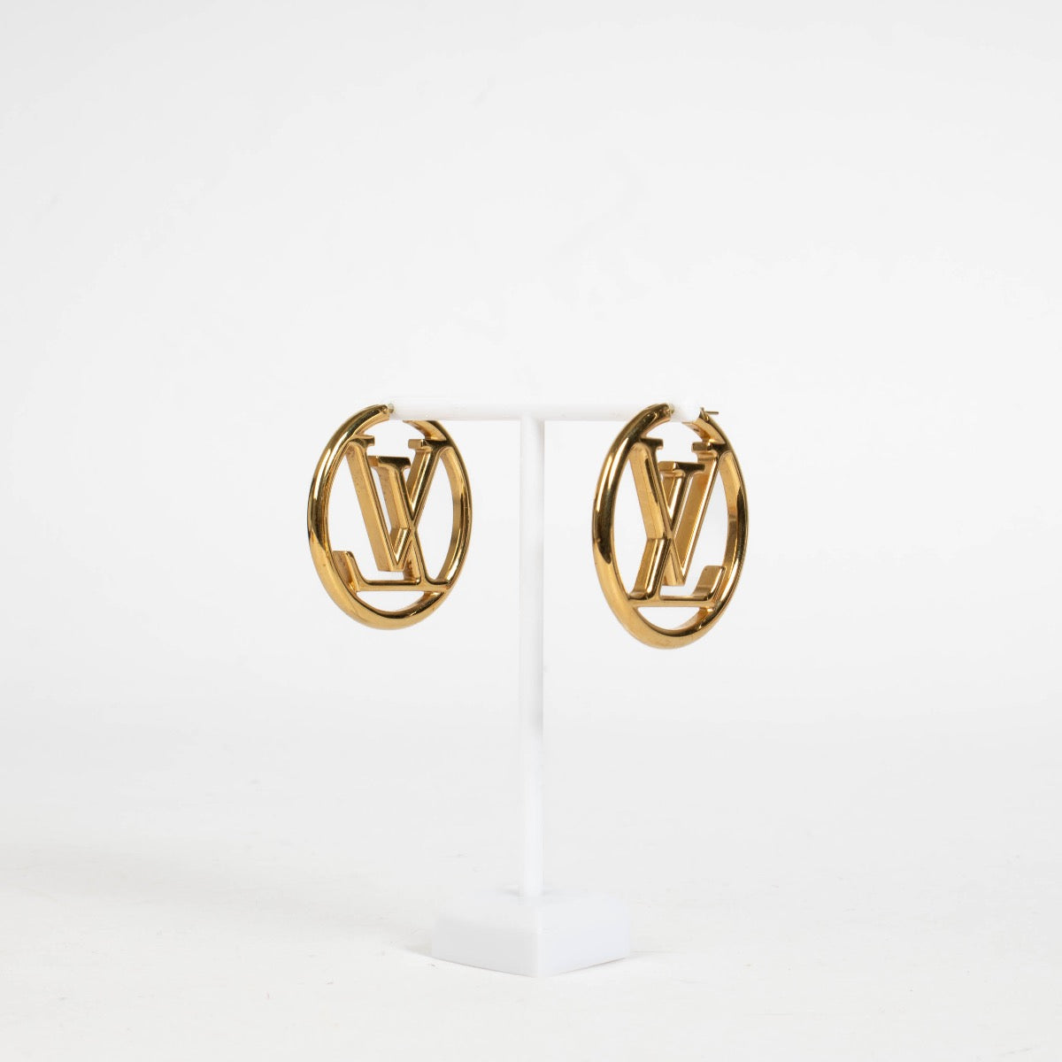 Authentic pre-loved Louis Vuitton Gold Hoop Earrings on Labellov.com