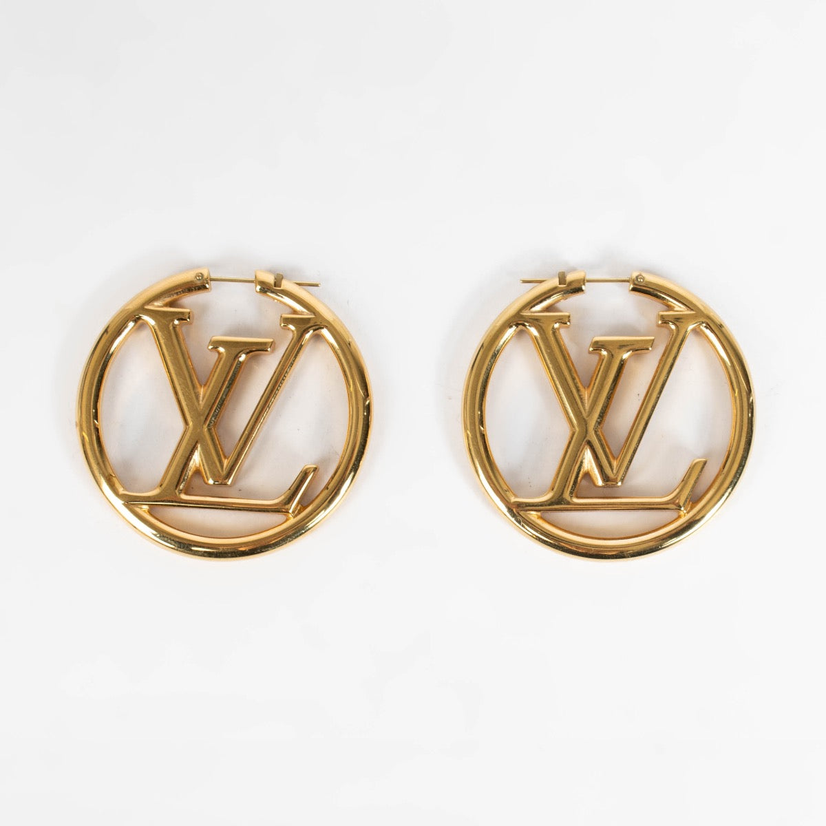 Authentic pre-loved Louis Vuitton Gold Hoop Earrings on Labellov.com