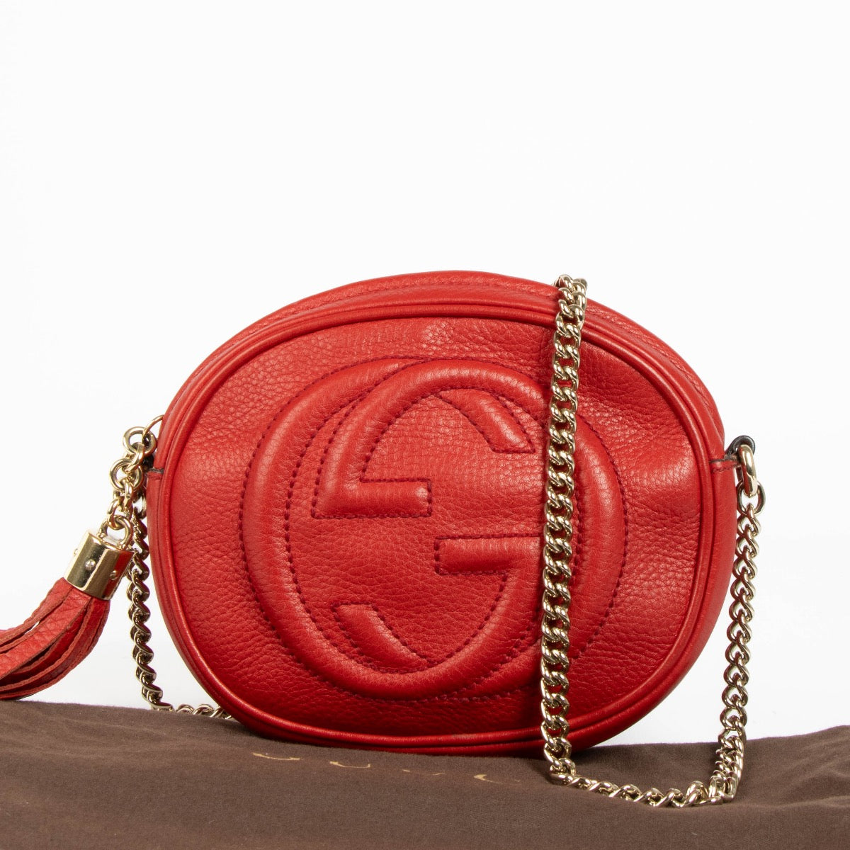 Authentic pre-loved Gucci Red Soho Round Bag on Labellov.com