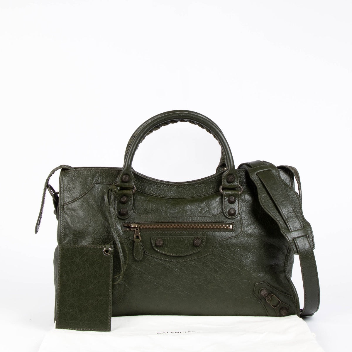 Authentic pre-loved Balenciaga Green Arena Medium City Top Handle Bag on Labellov.com