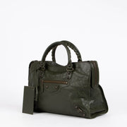 Authentic pre-loved Balenciaga Green Arena Medium City Top Handle Bag on Labellov.com