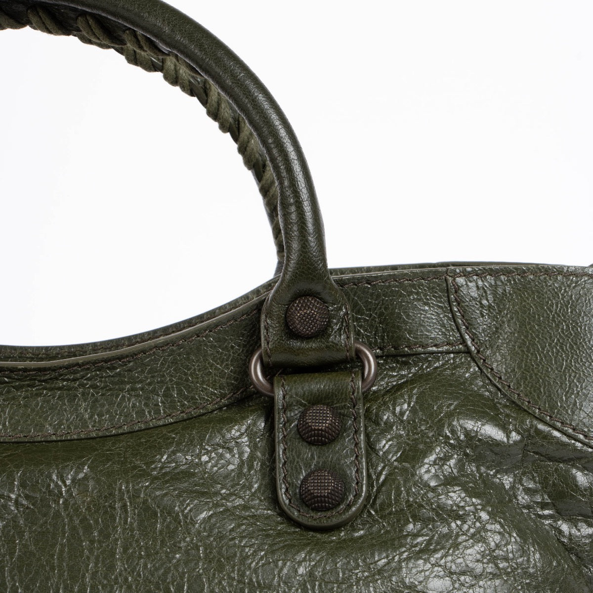 Authentic pre-loved Balenciaga Green Arena Medium City Top Handle Bag on Labellov.com