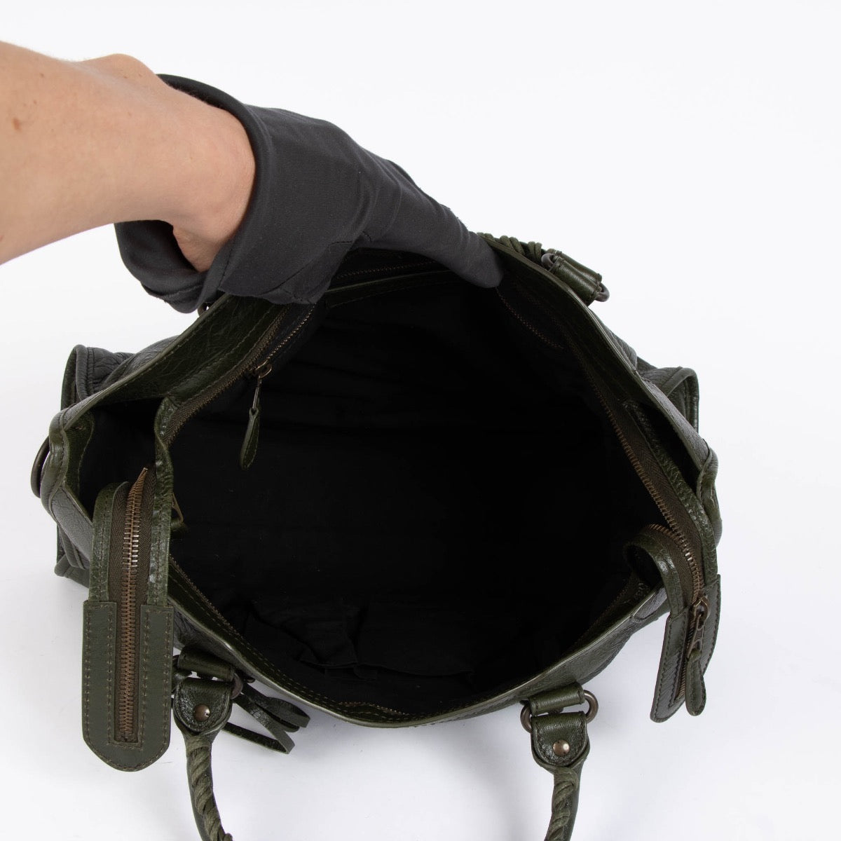 Authentic pre-loved Balenciaga Green Arena Medium City Top Handle Bag on Labellov.com