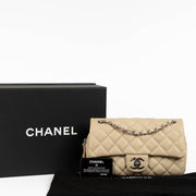 Authentic pre-loved Chanel Beige Leather Medium Easy Flap Bag on Labellov.com