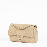 Authentic pre-loved Chanel Beige Leather Medium Easy Flap Bag on Labellov.com
