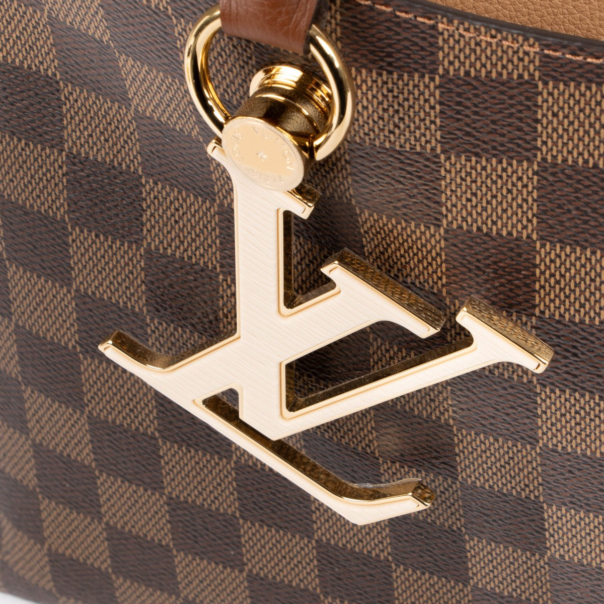 Authentic pre-loved Louis Vuitton Damier Ebene Riverside Top Handle Bag on Labellov.com