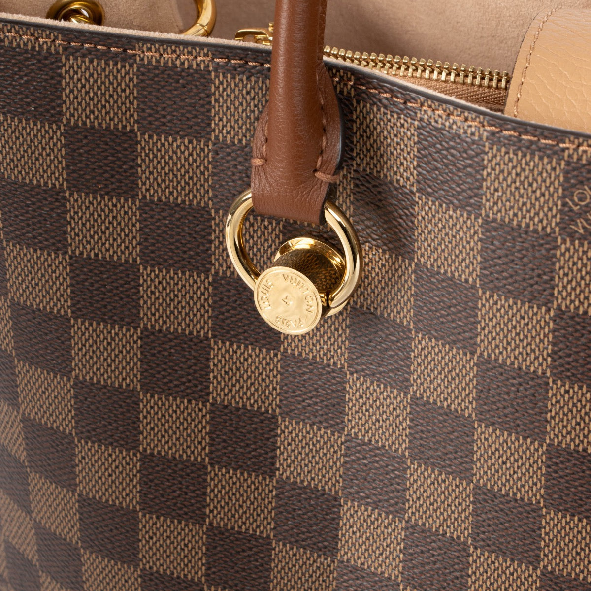 Authentic pre-loved Louis Vuitton Damier Ebene Riverside Top Handle Bag on Labellov.com