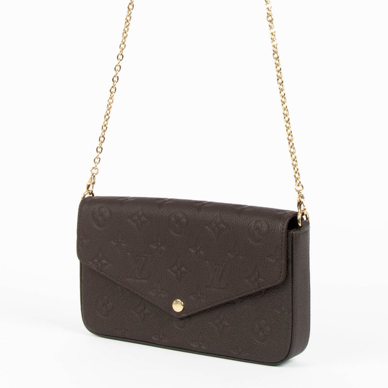 Shop safe online at Labellov in Antwerp, Brussels and Knokke this 100% authentic second hand Louis Vuitton Chocolat Empreinte Pochette Félicie