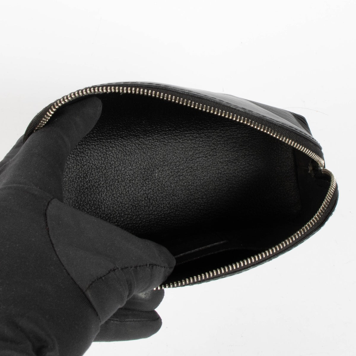 Authentic pre-loved Louis Vuitton Black Epi Leather Pouch on Labellov.com
