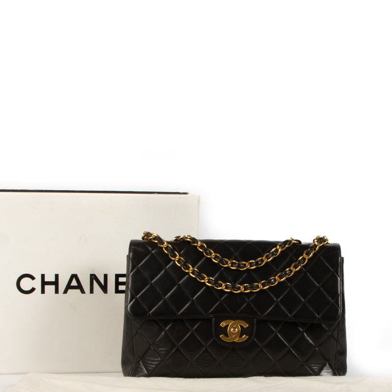 Shop safe online at Labellov in Antwerp, Brussel and Knokke this 100% authentic second hand Chanel Black Lambskin Large Classic Flap Bag