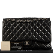Shop safe online at Labellov in Antwerp, Brussels and Knokke this 100% authentic second hand Chanel Black Lambskin Maxi Classic Single Flap Bag